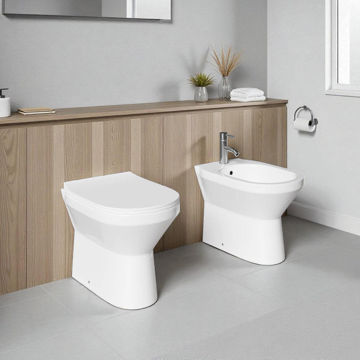 coppia-di-sanitari-filomuro-in-ceramica-rimless-con-copriwc-softclose-caddy