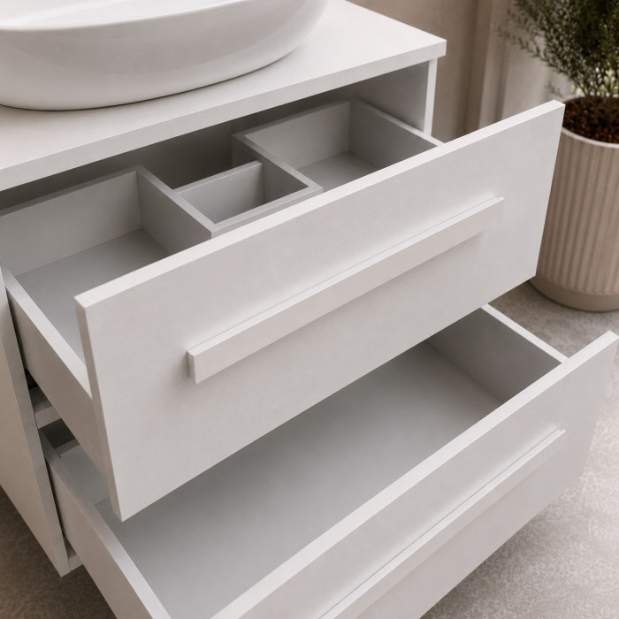 Dettaglio cassetti soft close del mobile bagno da 100 cm Lirioa cemento bianco