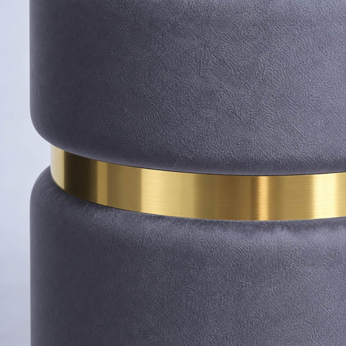 Pouf cilindrici grigi con anello centrale dorato