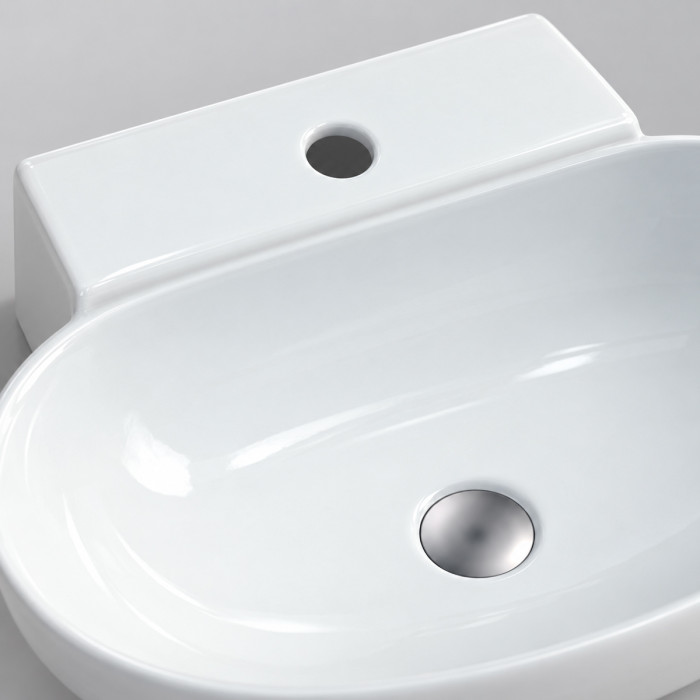 Lavabo SWING installato da appoggio su mobile bagno moderno