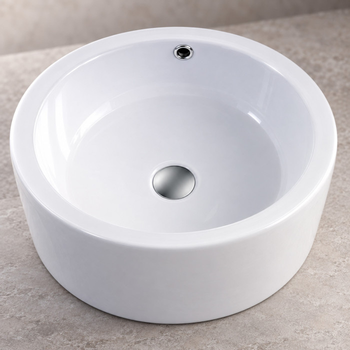 Lavabo rotondo TRIBAL ambientato su mobile bagno moderno